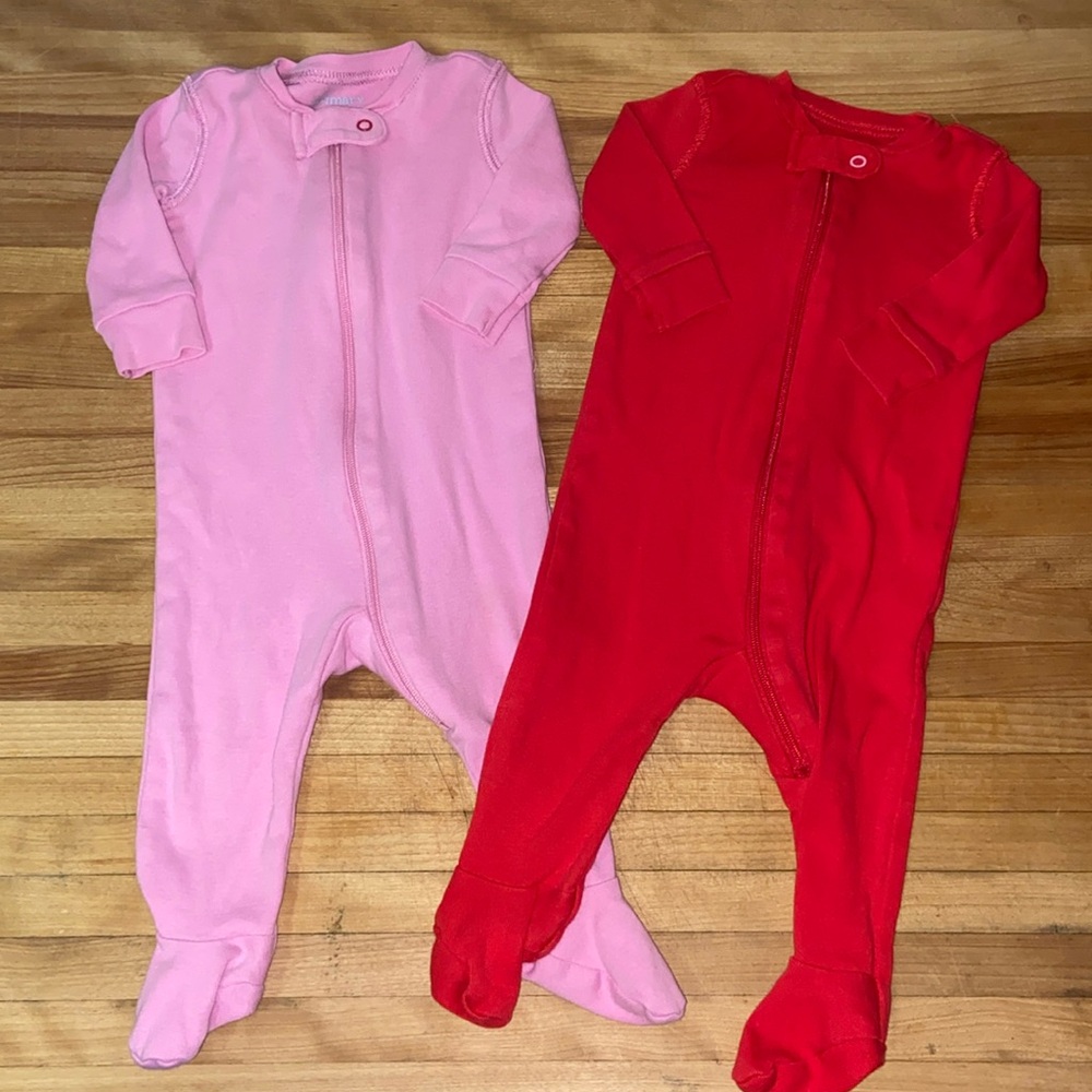 Pair of Primary 0-3 month footie pajamas